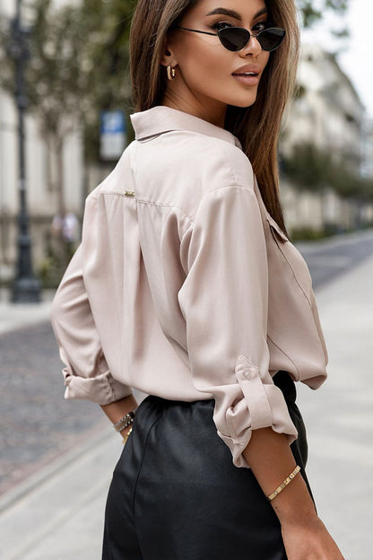 Beige Long Sleeve IVON Shirt crafted from soft lyocell fabric, featuring stylish roll-up sleeves and functional front pockets, perfect for both office wear and casual outings.