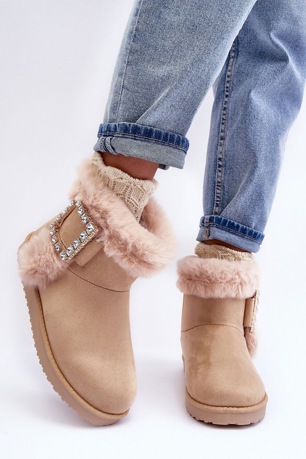 Elegant eco-suede snow boots with luxurious fur insulation and stylish buckle detail, perfect for chic winter wear.