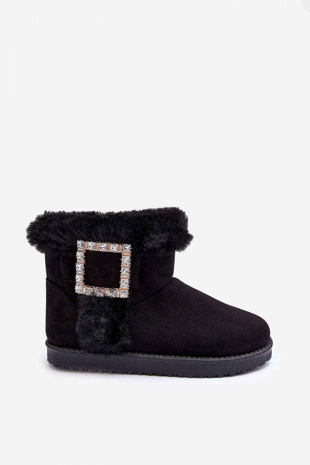 Luxurious eco-suede snow boots featuring exquisite fur insulation and elegant buckle detail, ideal for cold weather styling.