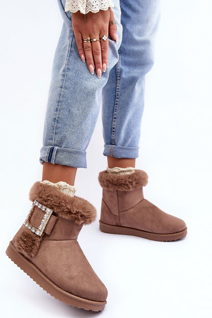 Stylish snow boots made from premium eco-suede, showcasing plush fur lining for warmth and a chic buckle accent for fashionable autumn-winter wear.