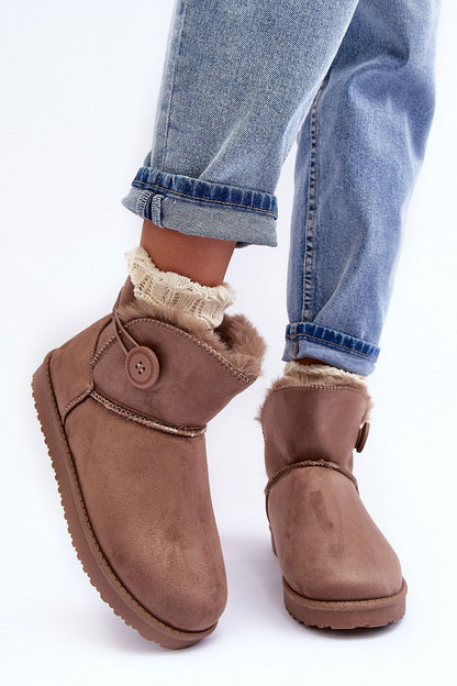 Luxury eco-suede snow boots featuring thick fur insulation for exceptional warmth and comfort during winter, designed for style and functionality with a classic silhouette.
