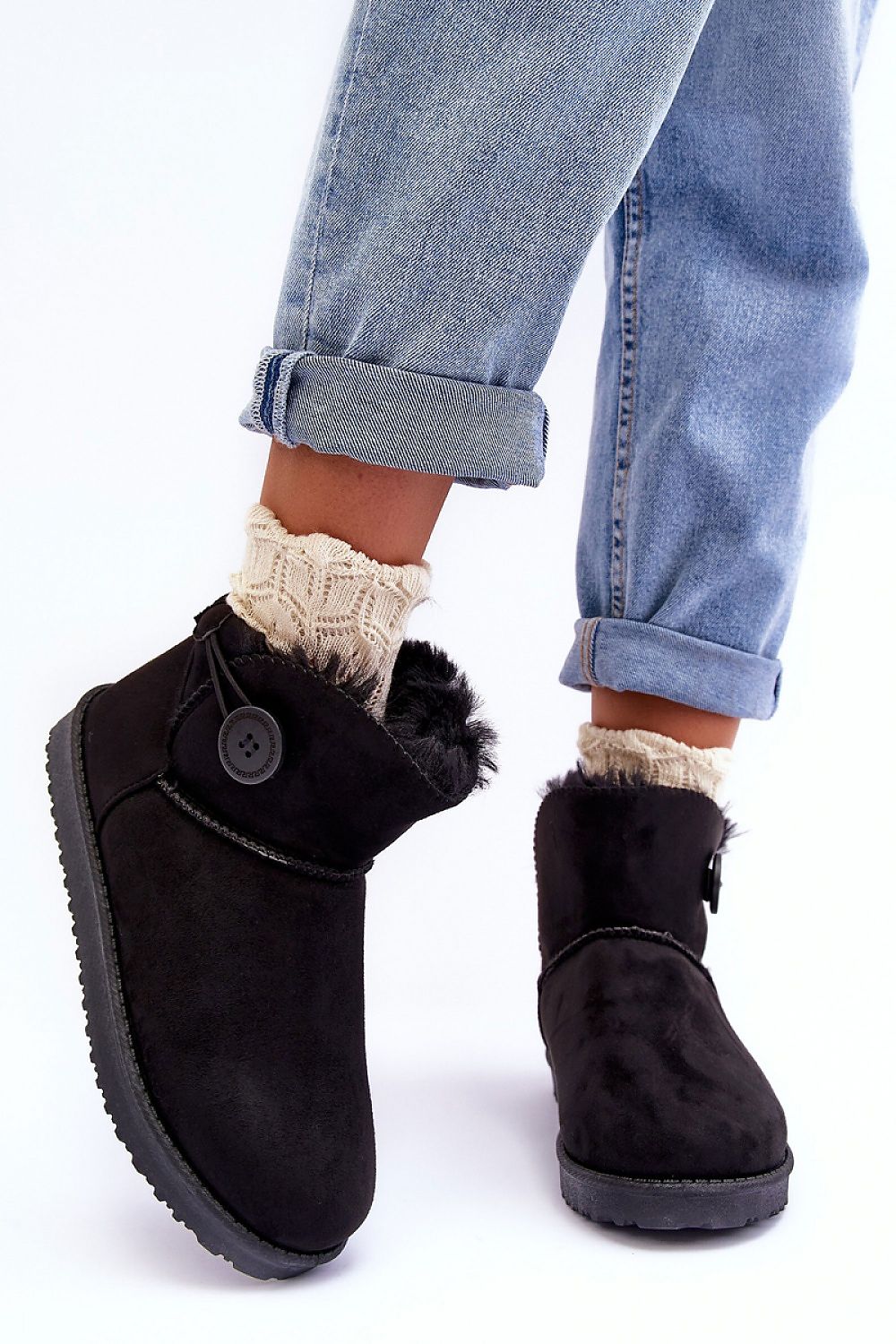 Chic winter footwear with plush fur lining, embodying luxury and warmth for the discerning individual.
