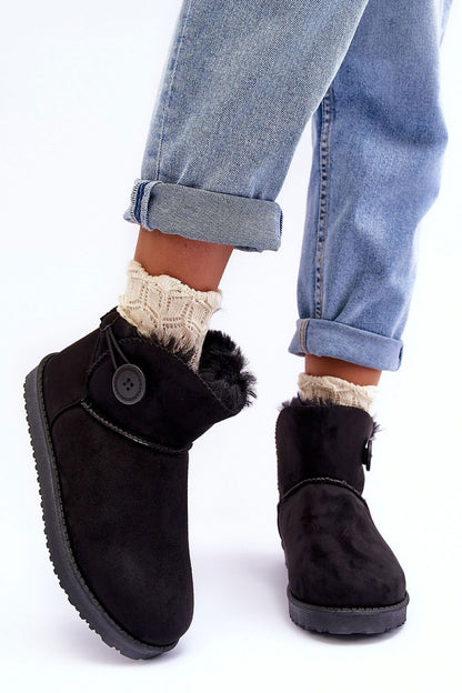Chic winter footwear with plush fur lining, embodying luxury and warmth for the discerning individual.