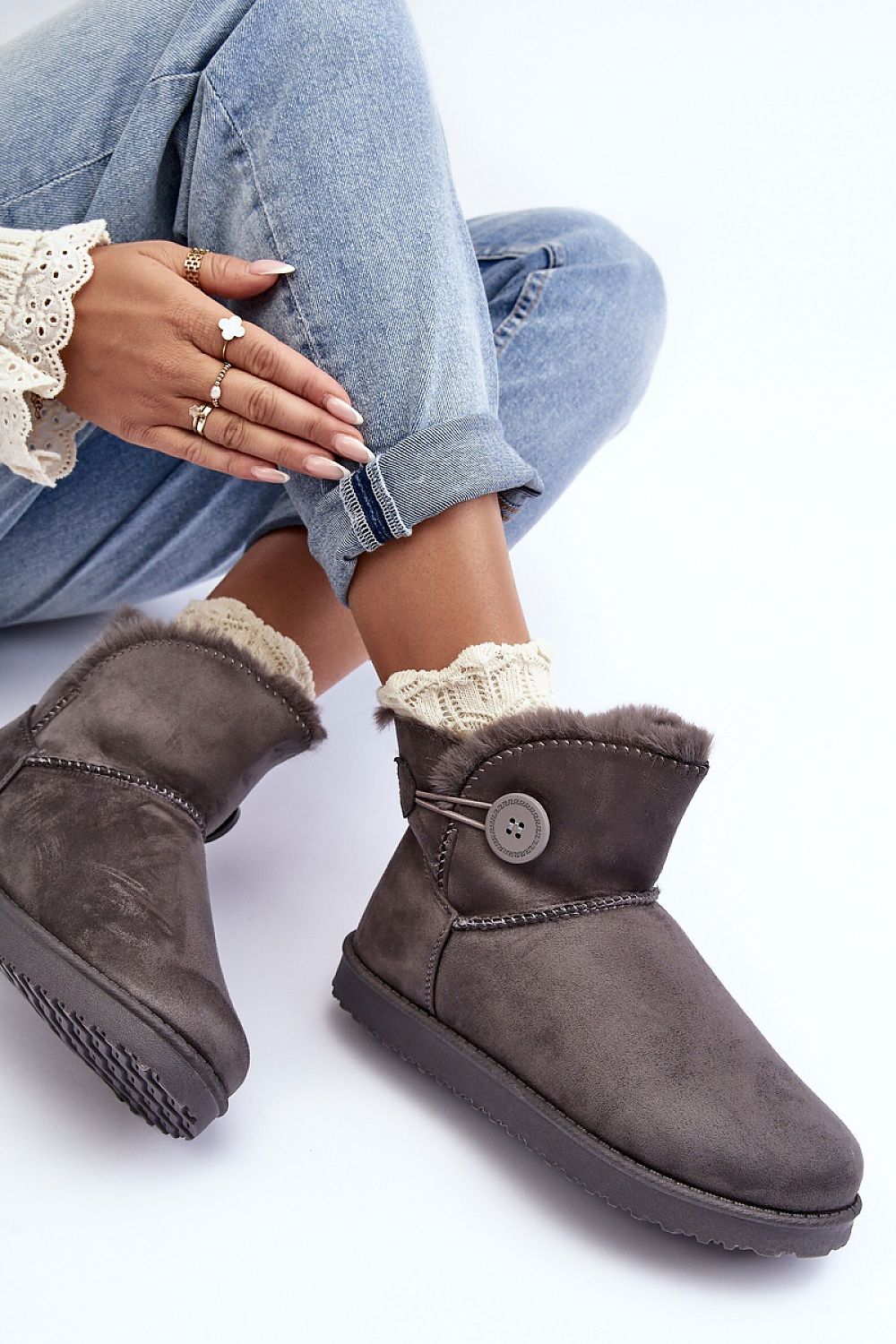Elegant winter snow boots with a classic design, showcasing eco-suede material and plush fur lining for superior warmth and style.