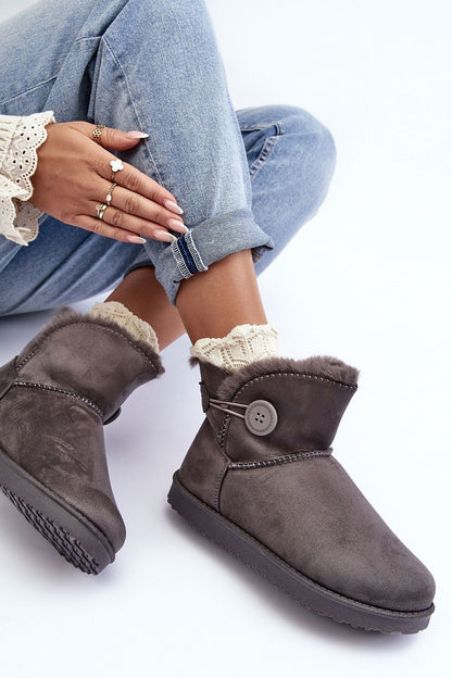Elegant winter snow boots with a classic design, showcasing eco-suede material and plush fur lining for superior warmth and style.