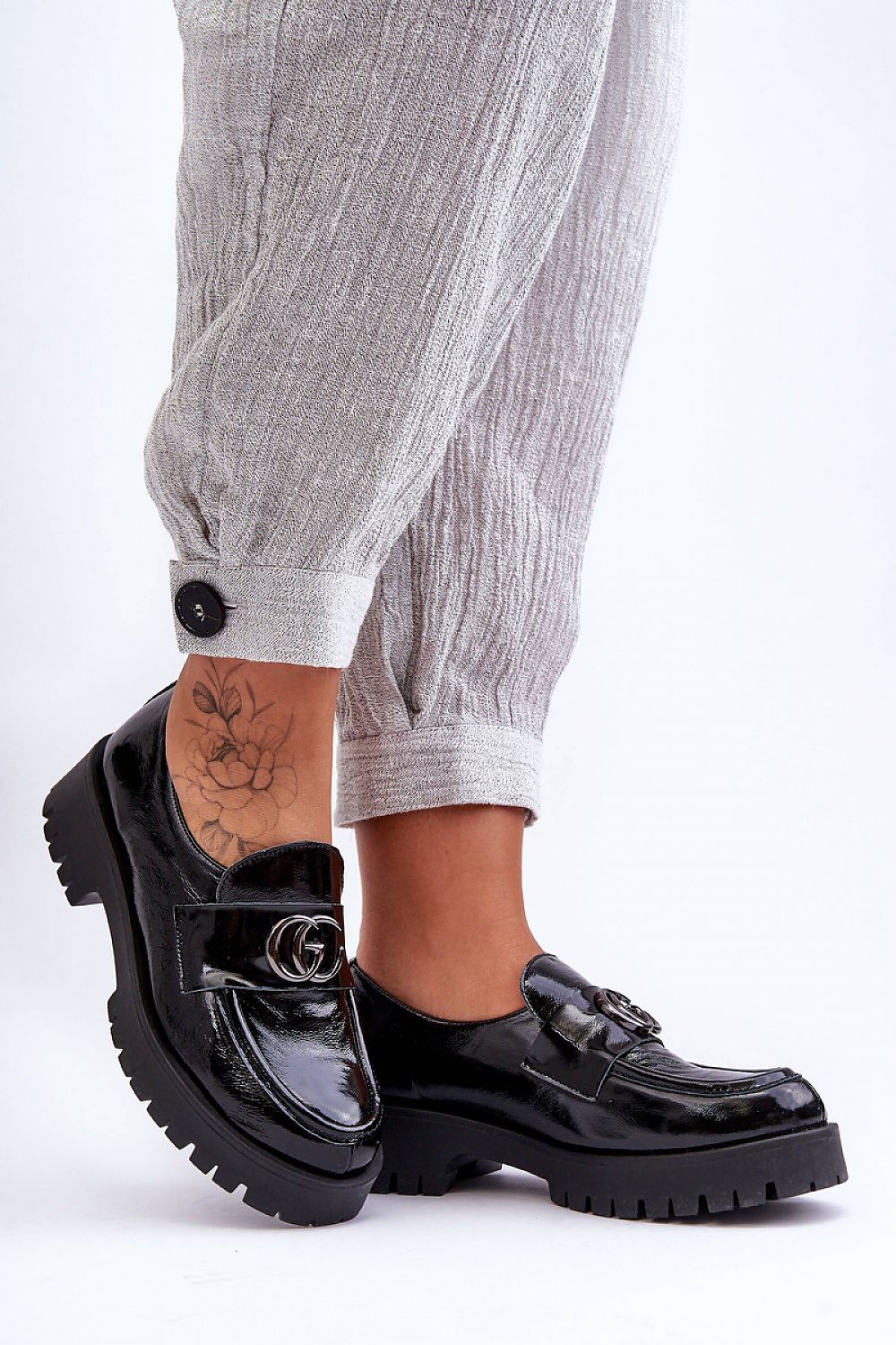 Close-up of luxurious natural leather women's half shoes showcasing the refined craftsmanship and comfortable insole, ideal for a sophisticated look.