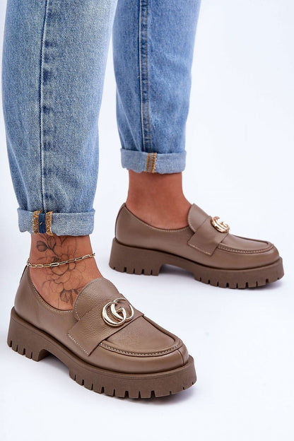 Elegant women's leather slip-on half shoes with a stable heel, showcasing a luxurious design and natural leather finish.