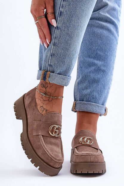 Stylish women's slip-on half shoes made of premium leather with a flat stable heel, ideal for both casual and formal wear.