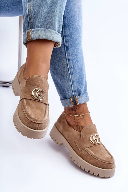 Luxurious women's leather half shoes set on a fashionable platform, highlighting the superior craftsmanship and timeless elegance suitable for various stylish occasions.