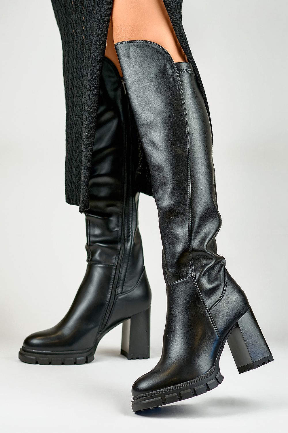 Sophisticated PRIMO tall boots featuring a stylish stiletto heel, eco leather construction, and cozy fur interior, ideal for elegant winter fashion.