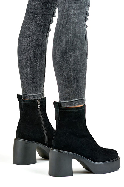 Close-up of PRIMO high heel boots showcasing the premium natural leather finish, luxurious fur lining, and the stylish 8cm stiletto heel, emphasising elegance and comfort.