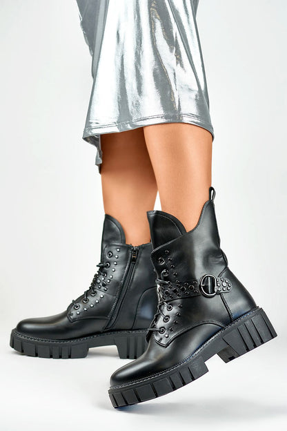 Elegant PRIMO bootie featuring 18 cm eco leather upper, 4.5 cm heel, stylish zipper closure, and distinctive buckle detail, perfect for chic autumn and winter outings.