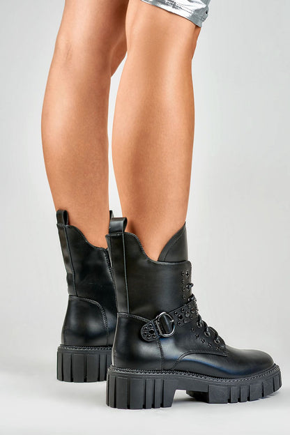 Luxurious PRIMO bootie featuring a high 18 cm eco leather upper, elegant 4.5 cm heel, and stylish zipper closure with a unique buckle detail, perfect for sophisticated autumn and winter fashion.