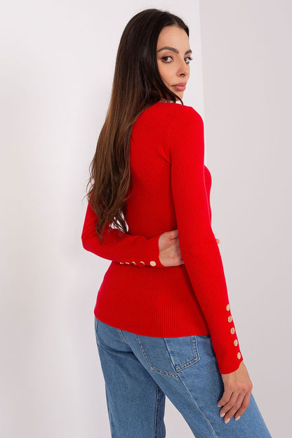 Detail of elegant button sleeves on a viscose sweater, highlighting the stylish and practical design for colder weather.