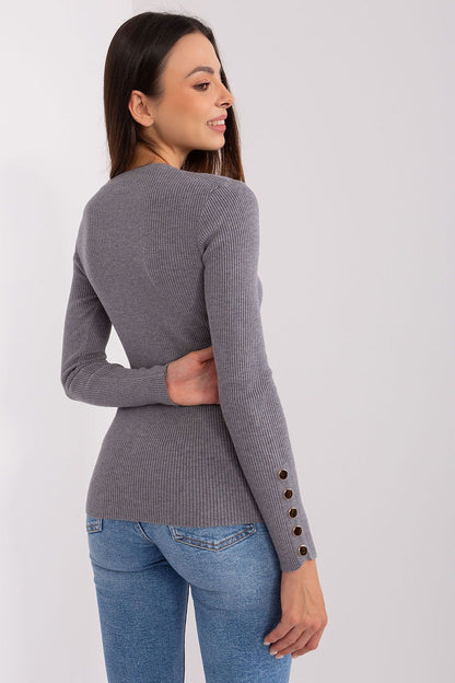 Display of stylish long sleeve viscose sweater with a round neckline, ideal for chic winter outfits.