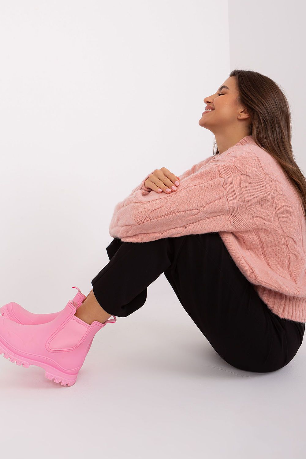 Close-up view of the stylish variegated fabric texture of an elegant women's acrylic sweater, perfect for professional attire.