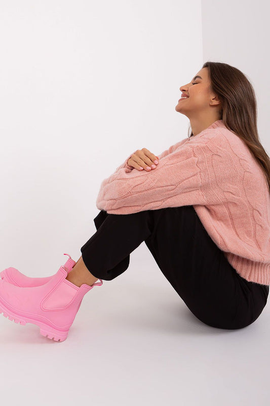 Close-up view of the stylish variegated fabric texture of an elegant women's acrylic sweater, perfect for professional attire.