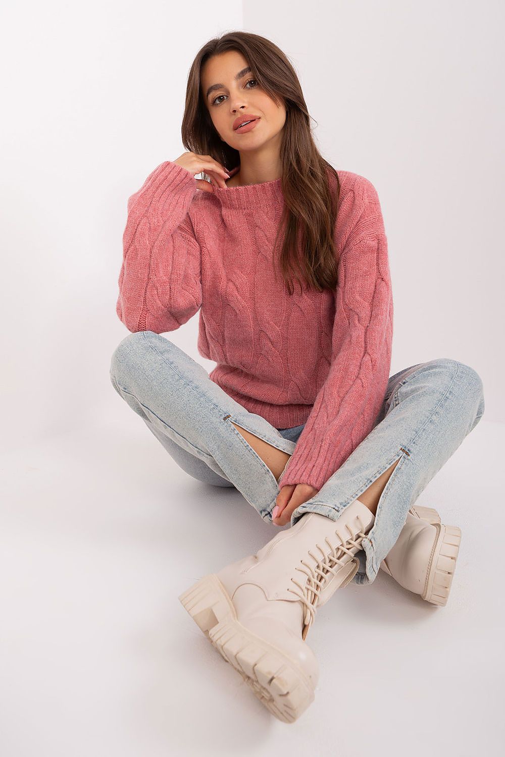 Elegant women's acrylic sweater showcasing unique variegated texture with classic round neckline and long sleeves, ideal for sophisticated work attire.