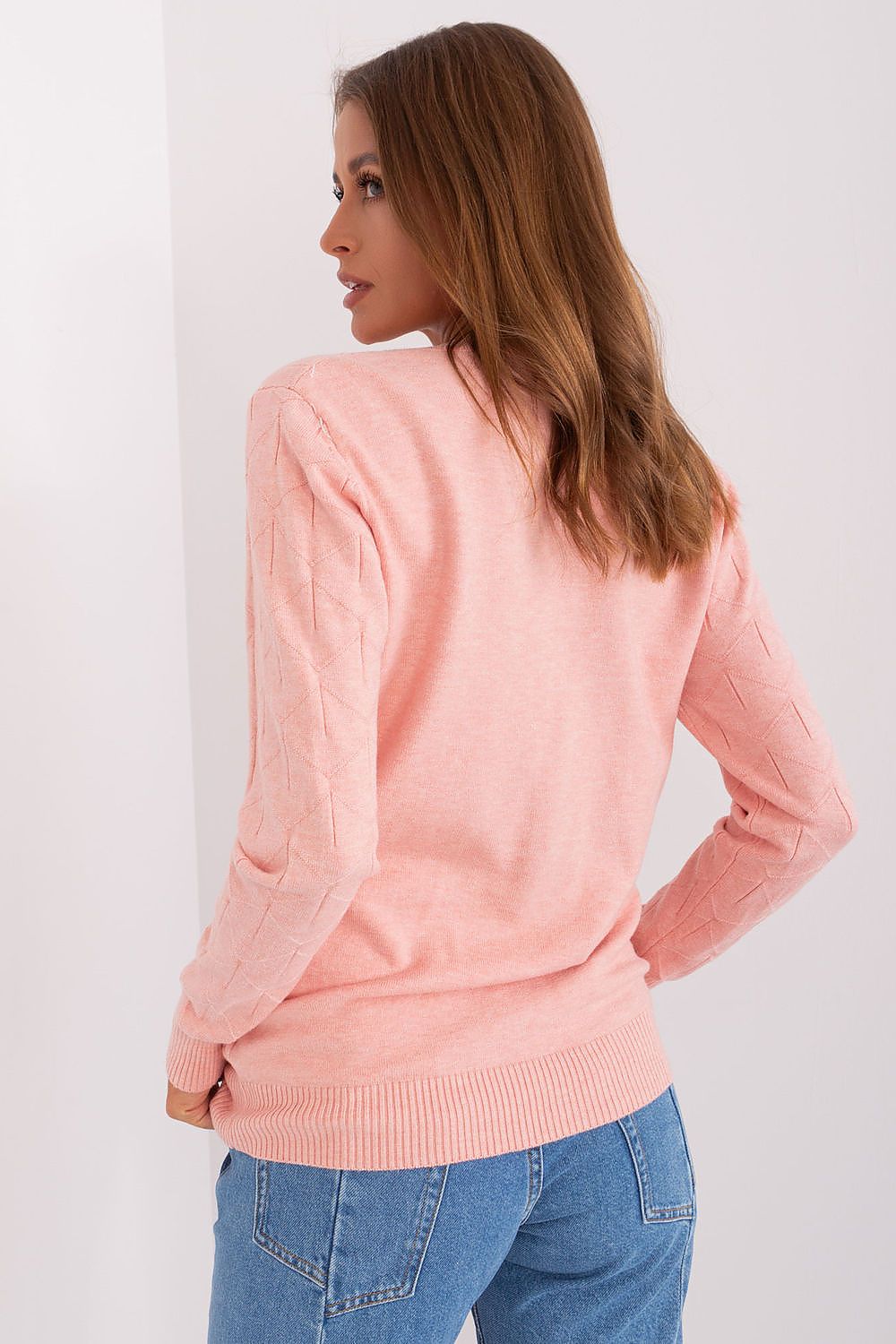 Versatile women's round-neck jumper in a soft cotton blend, designed for comfort and timeless elegance across various occasions.