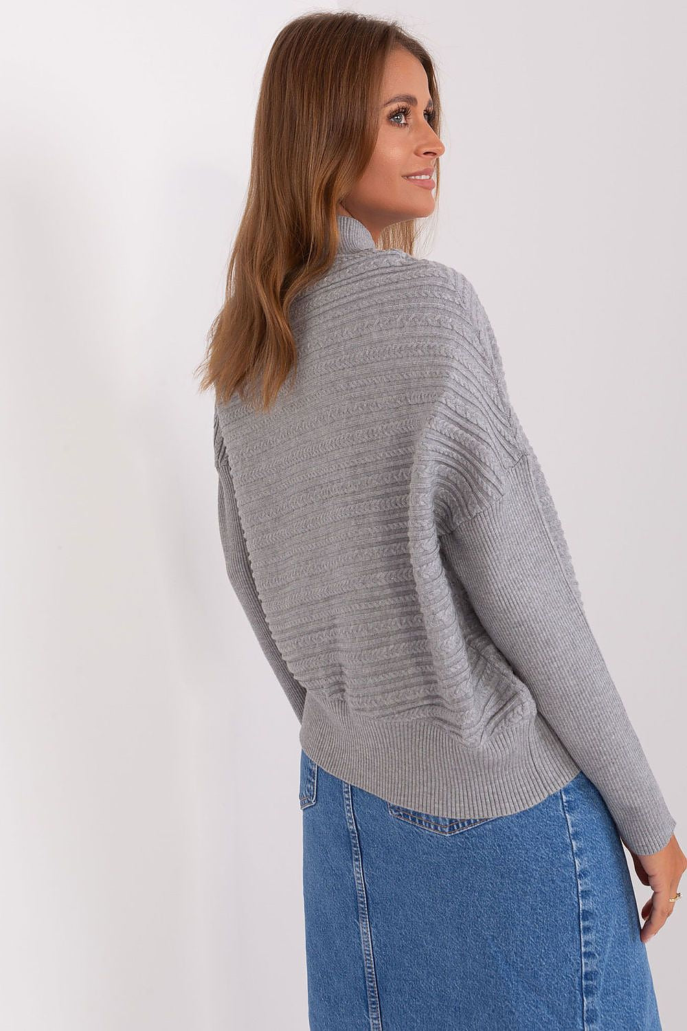 A fashionable ensemble featuring the luxurious women's variegated knit sweater, exemplifying comfort and style for daily wear.