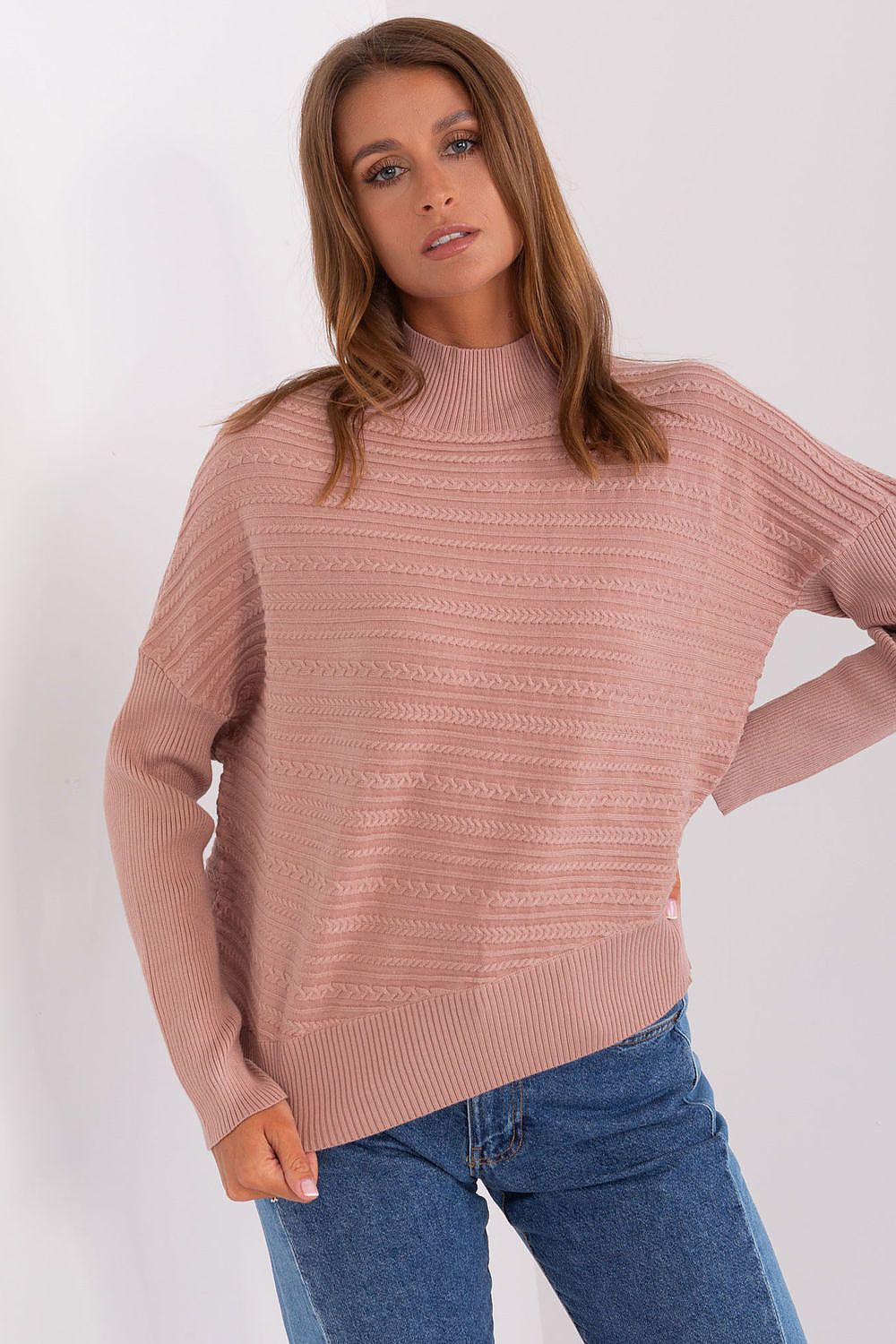 Fashionable women's variegated knit sweater draped over a chair, symbolising chic casual fashion for every occasion.