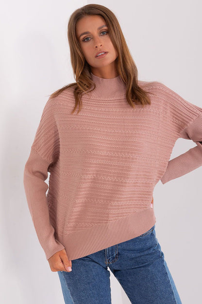 Fashionable women's variegated knit sweater draped over a chair, symbolising chic casual fashion for every occasion.