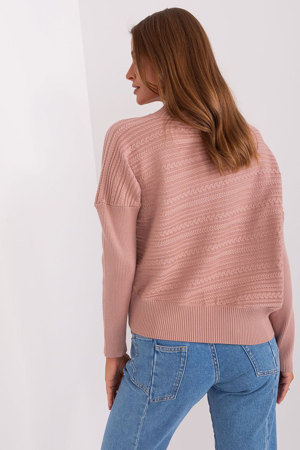 Close-up of the unique variegated fabric texture of the women's casual knit sweater, showcasing its luxurious quality.