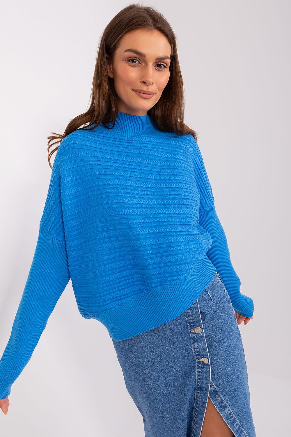 Luxurious women's variegated knit sweater featuring a low turtleneck and long sleeves for a sophisticated casual look.
