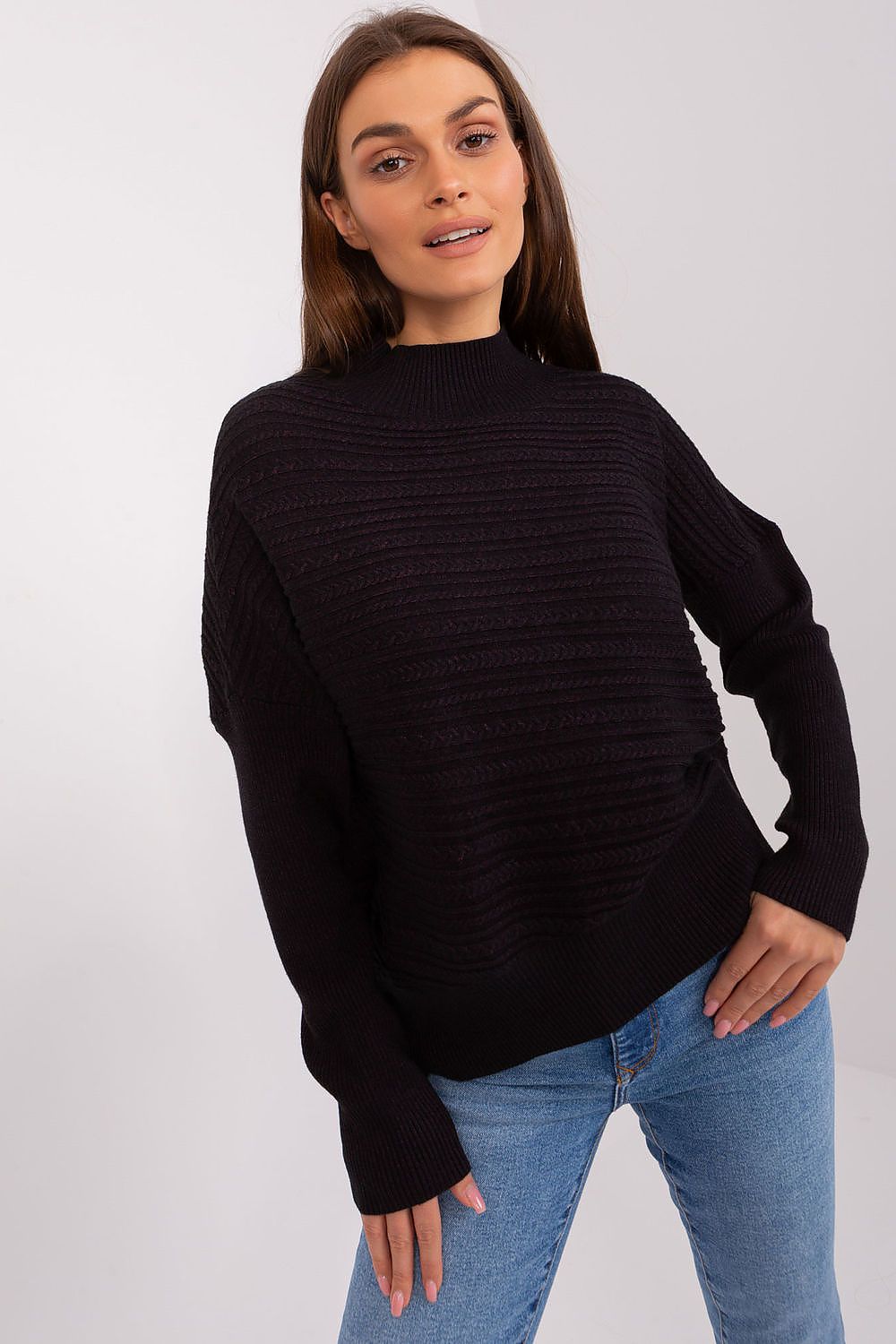 Elegant women's sweater with a low turtleneck and long sleeves, ideal for layering in stylish casual fashion.