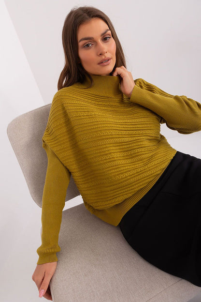 Elegant women's variegated knit sweater displayed on a mannequin, highlighting its chic and cosy design elements.