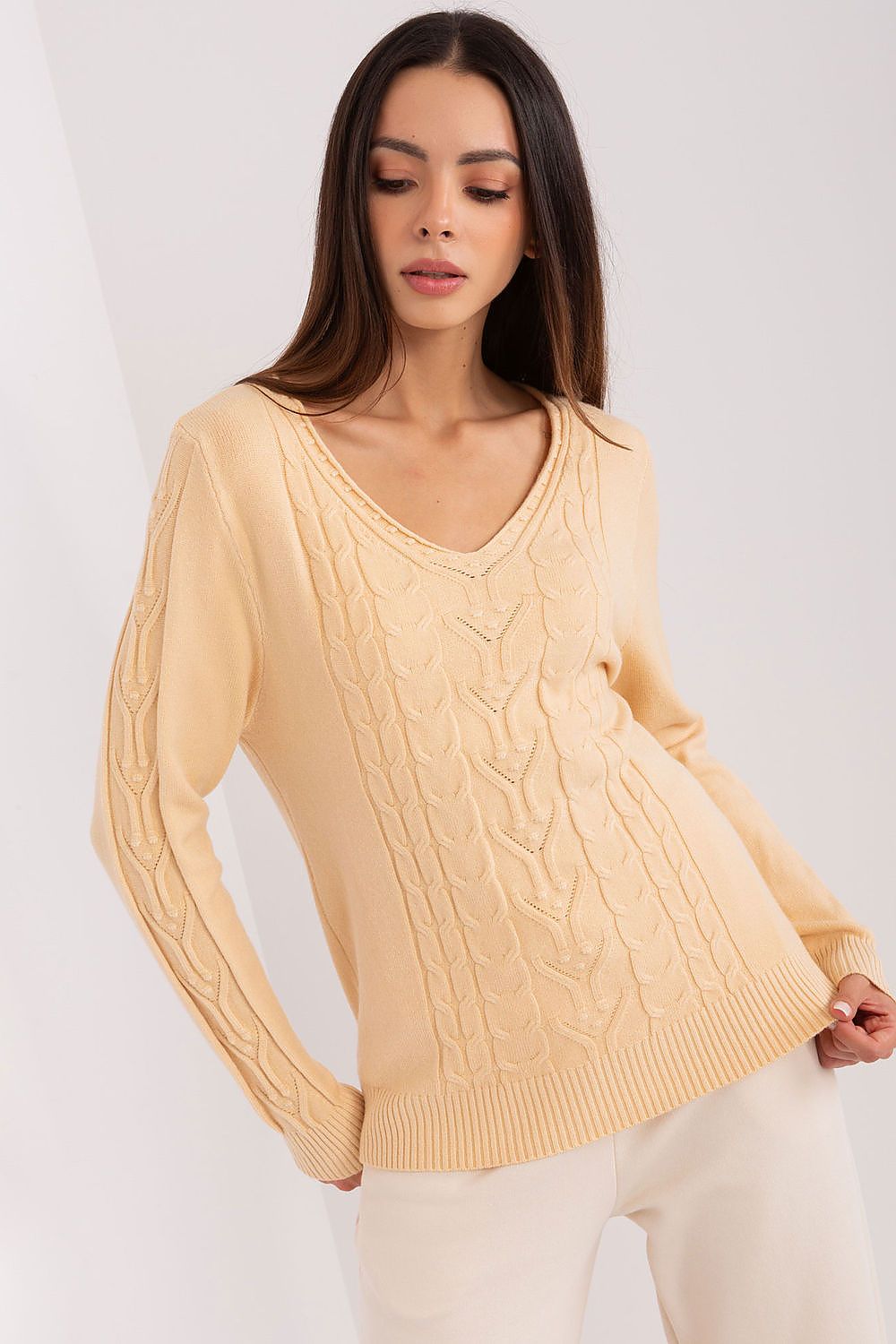 Elegant women's V-neck jumper in a soft cotton blend featuring a variegated texture, perfect for everyday stylish wear.