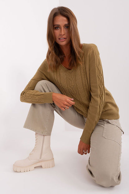Charming women's jumper in soft cotton blend with unique texture details, suitable for a variety of outfits from jeans to skirts.