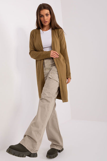 Luxurious knee-length women's cotton cardigan featuring an elegant openwork pattern, perfect for stylish casual outings.