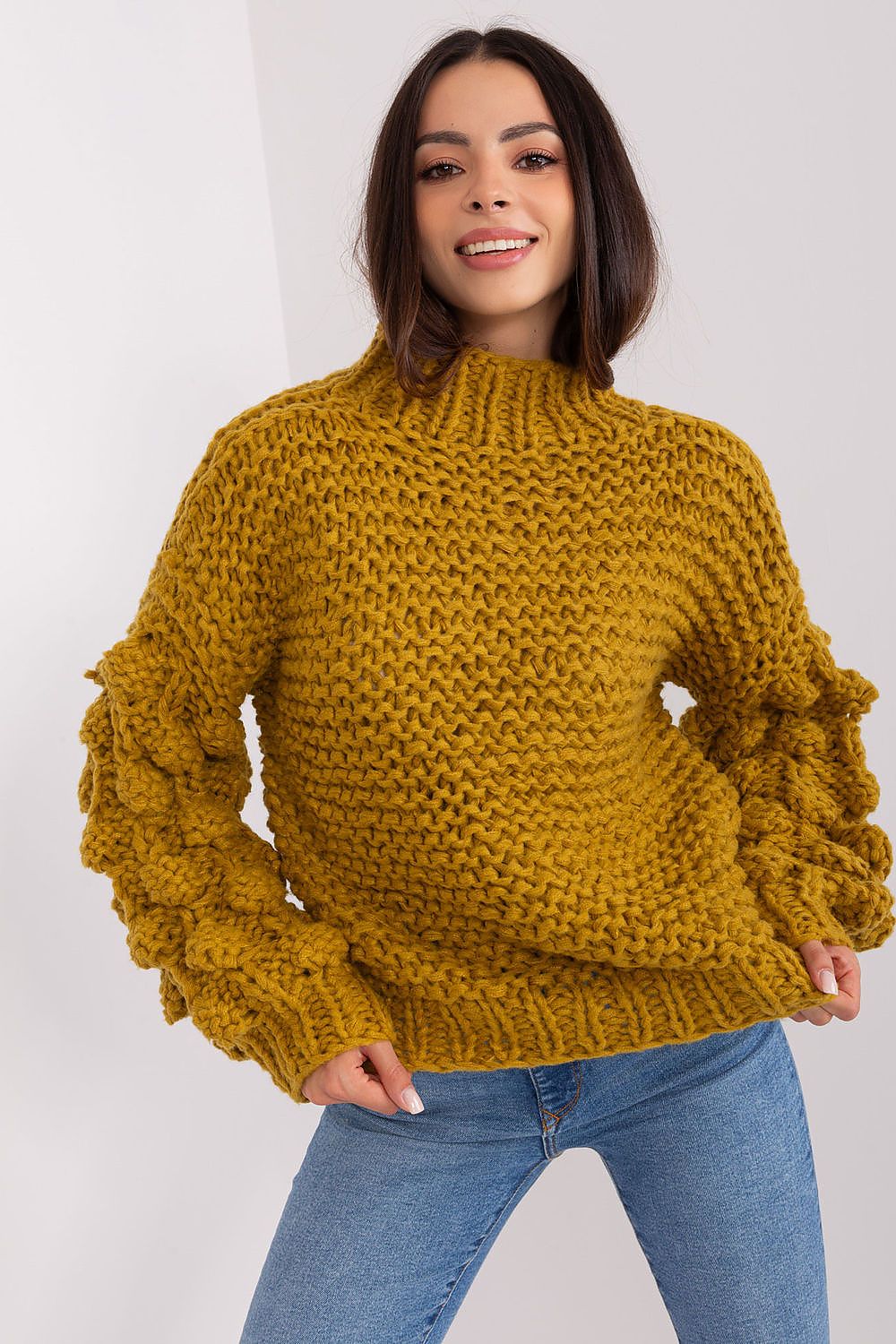 Close-up of the luxurious puff sleeve detail on an elegant round neck women's sweater, highlighting the trendy design and soft polyester fabric.