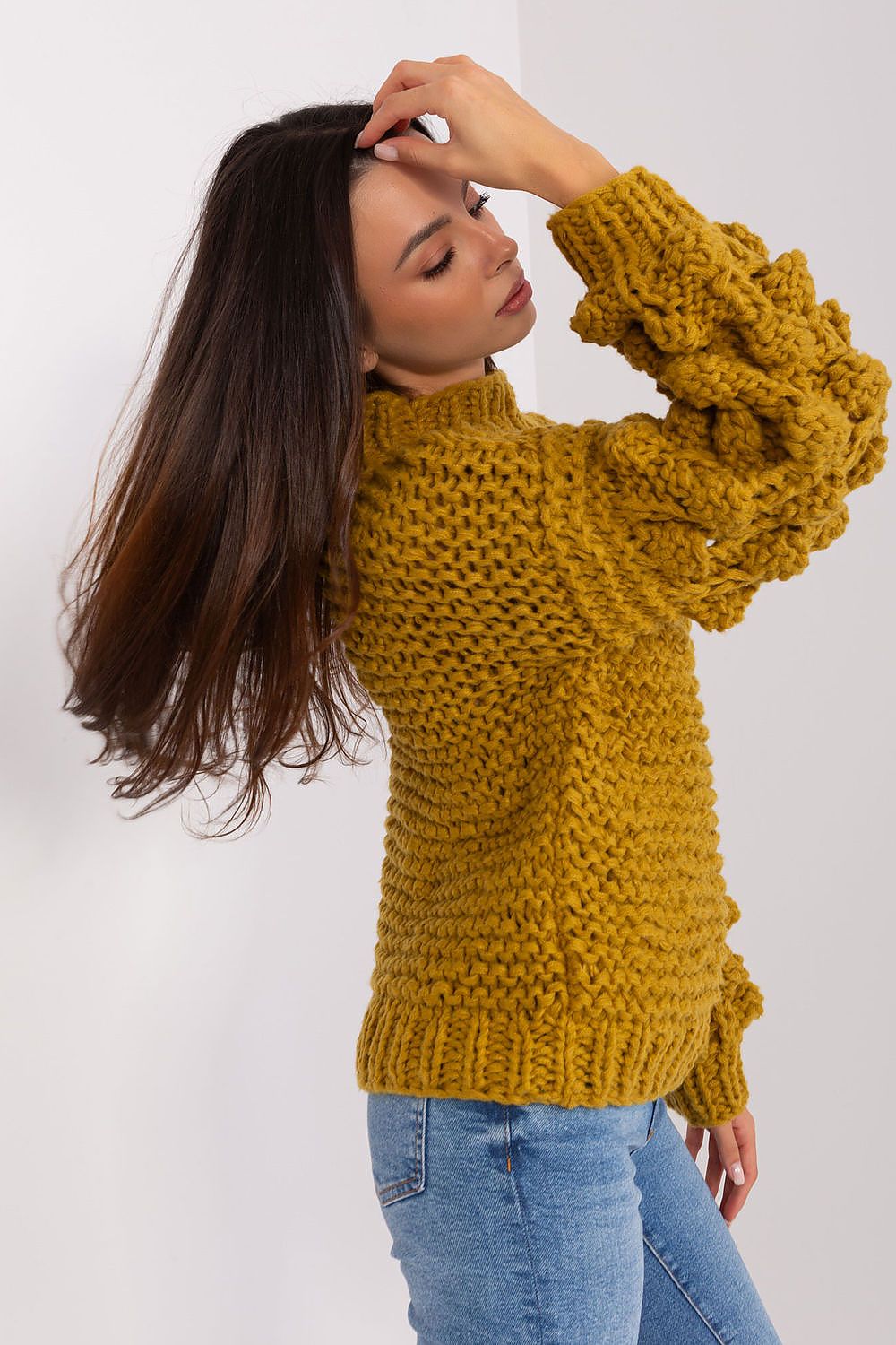 Elegant women's puff sleeve sweater in soft polyester, featuring a stylish round neckline and a chic thick weave texture.