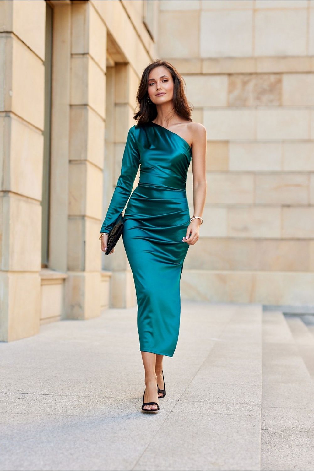 Close-up view of Roco Fashion's satin midi dress highlighting the delicate fabric and stylish one sleeve design, ideal for formal occasions.