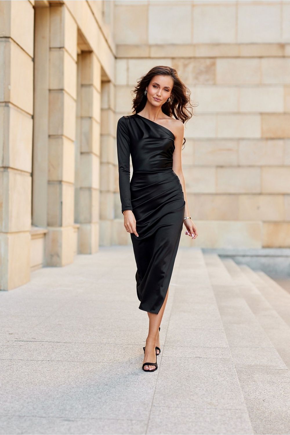 Elegant Roco Fashion satin midi dress featuring one long sleeve and stylish slit, perfect for evening wear.
