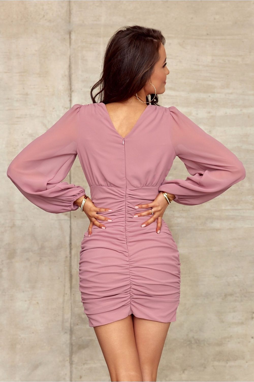 Close-up of the overlapping V-neckline and stylish long sleeves of the Roco Fashion Elegant Mini Dress, embodying luxury and elegance.