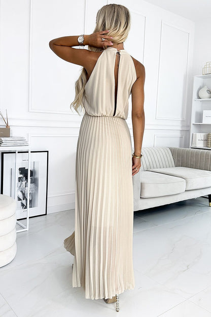 Exquisite back view of the Numoco beige pleated midi dress showcasing its deep neckline and luxurious chiffon fabric, ideal for stylish occasions.