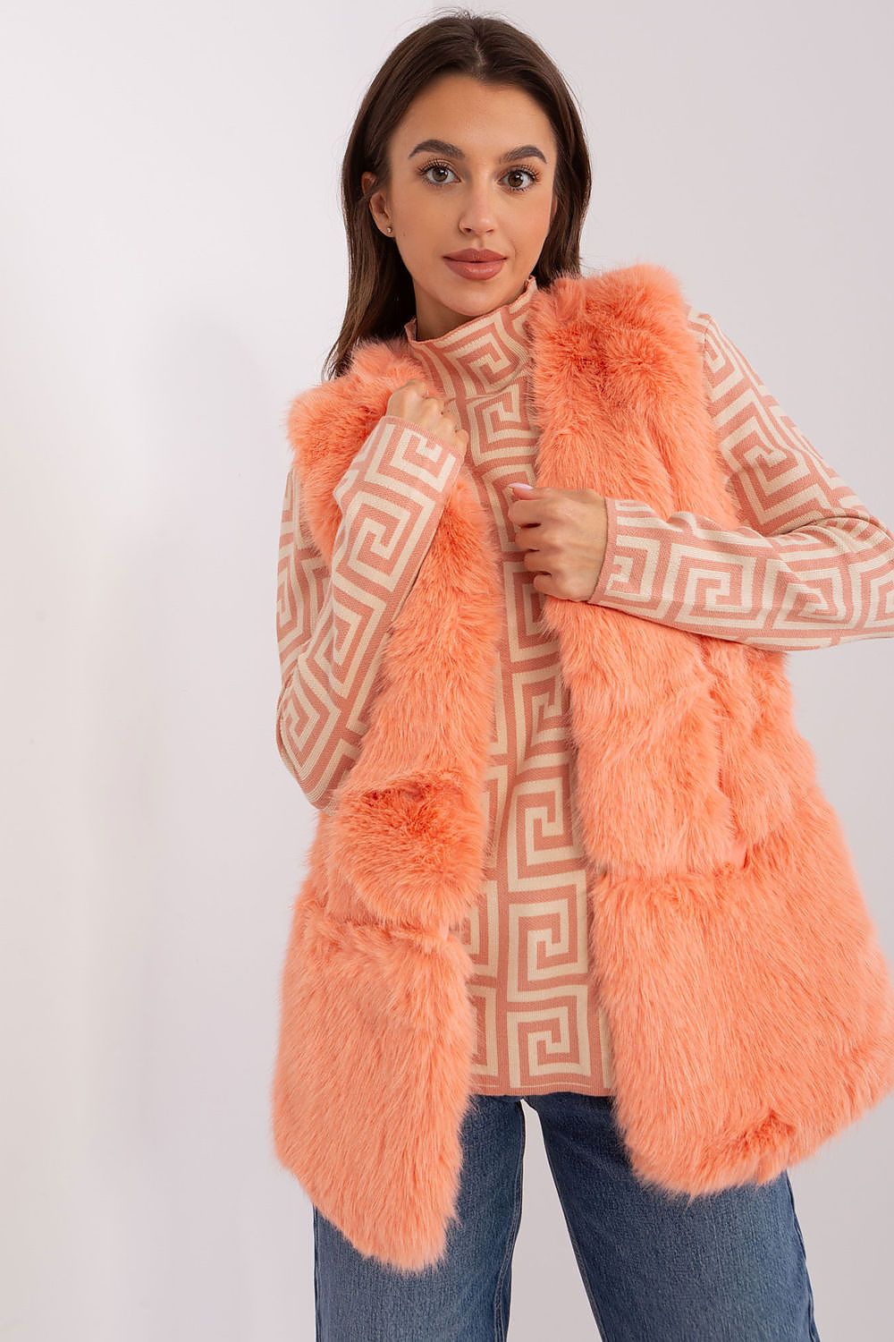 Luxurious polyester fur vest by AT featuring cozy pockets, perfect for autumn and winter style.