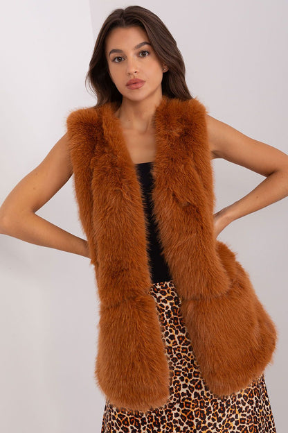 Chic polyester fur vest by AT, designed for cozy layering in colder seasons, ideal for adding flair to daily looks.