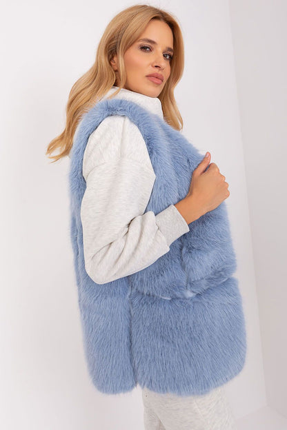 Fashionable fur vest with pockets by AT, showcasing a comfortable fit and lavish texture for stylish winter outfits.