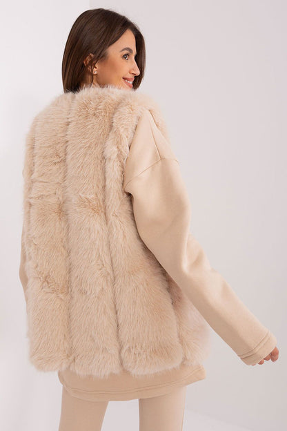 Luxurious polyester fur vest by AT with stylish pockets, perfect for autumn and winter fashion.