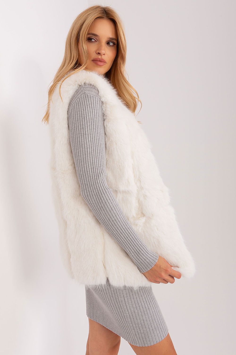 AT's chic cosy fur vest highlighting versatility for casual looks in autumn and winter fashion.