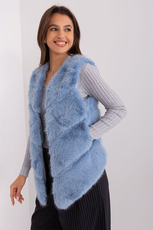 Stylish fur vest by AT featuring practical pockets, ideal for a sophisticated yet casual look in cooler weather.
