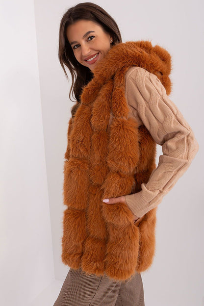 Warm and fashionable Women's fur vest by AT, showcasing a zipper closure and inner lining for comfort.