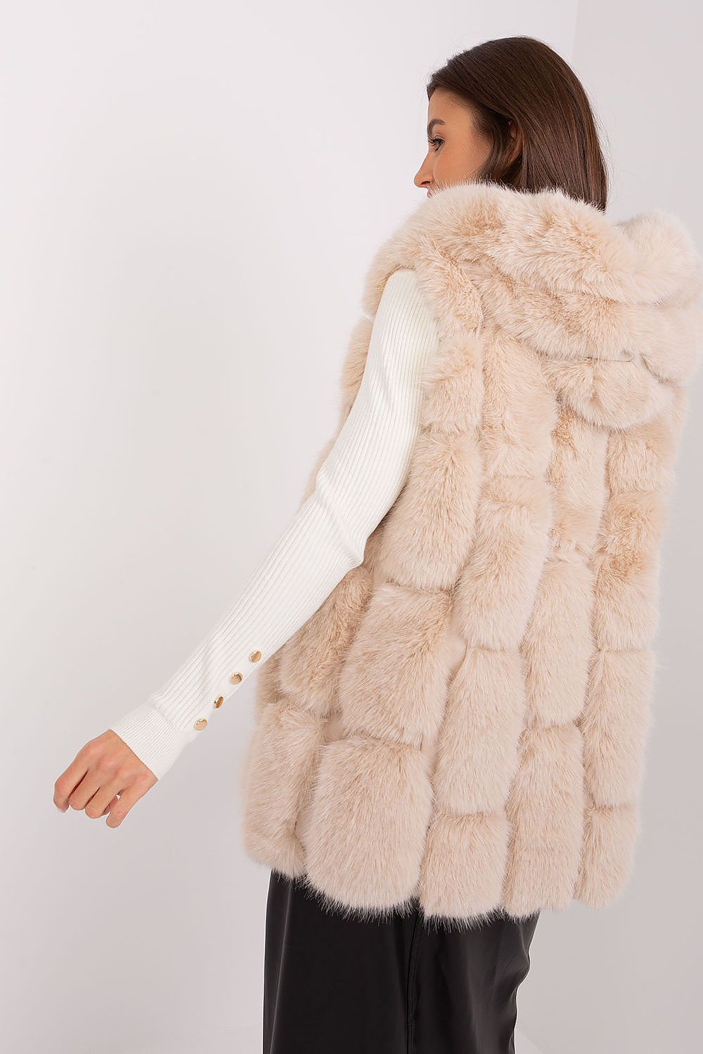 Luxurious polyester fur vest with practical pockets and a hood, offered by AT for chic winter occasions.