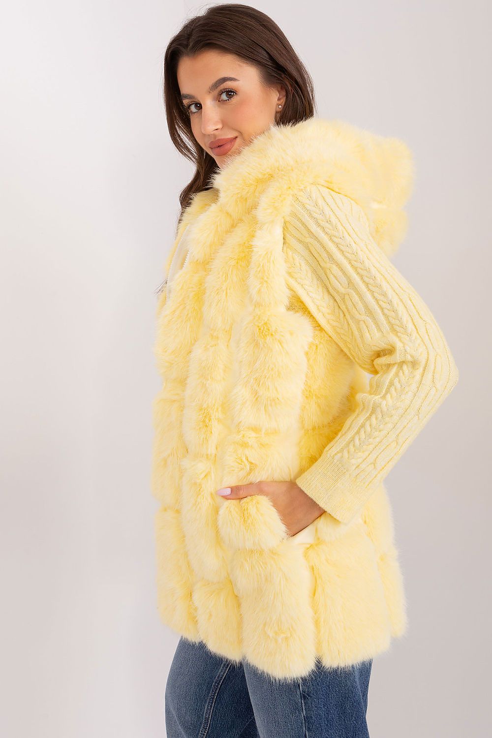 AT's elegant women's fur vest, beautifully combining comfort and sophistication for both casual and formal outings.