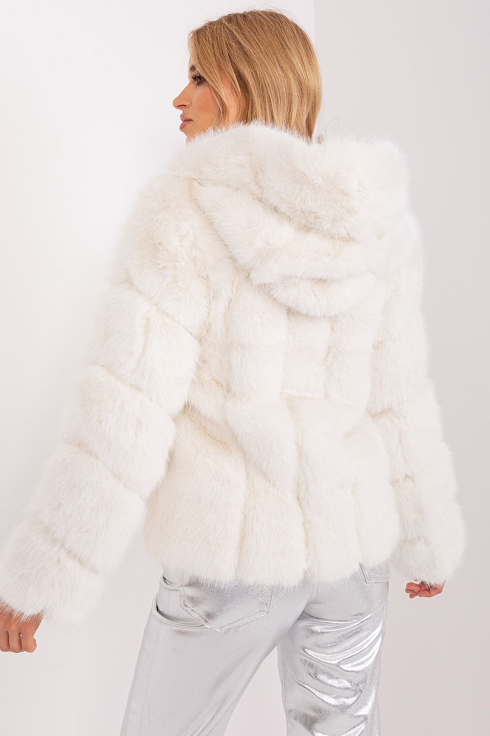 AT elegant 100% polyester fur jacket with hood and pockets, perfect for cold days, showcases luxury style and comfort.