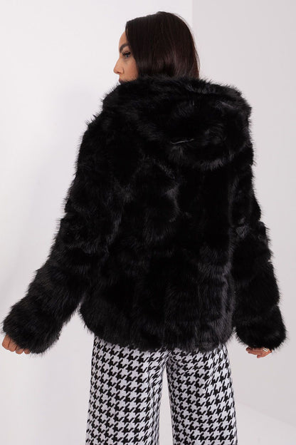 AT transitional fur jacket with hood, beautifully lined, offering both functionality and sophistication for cold weather.